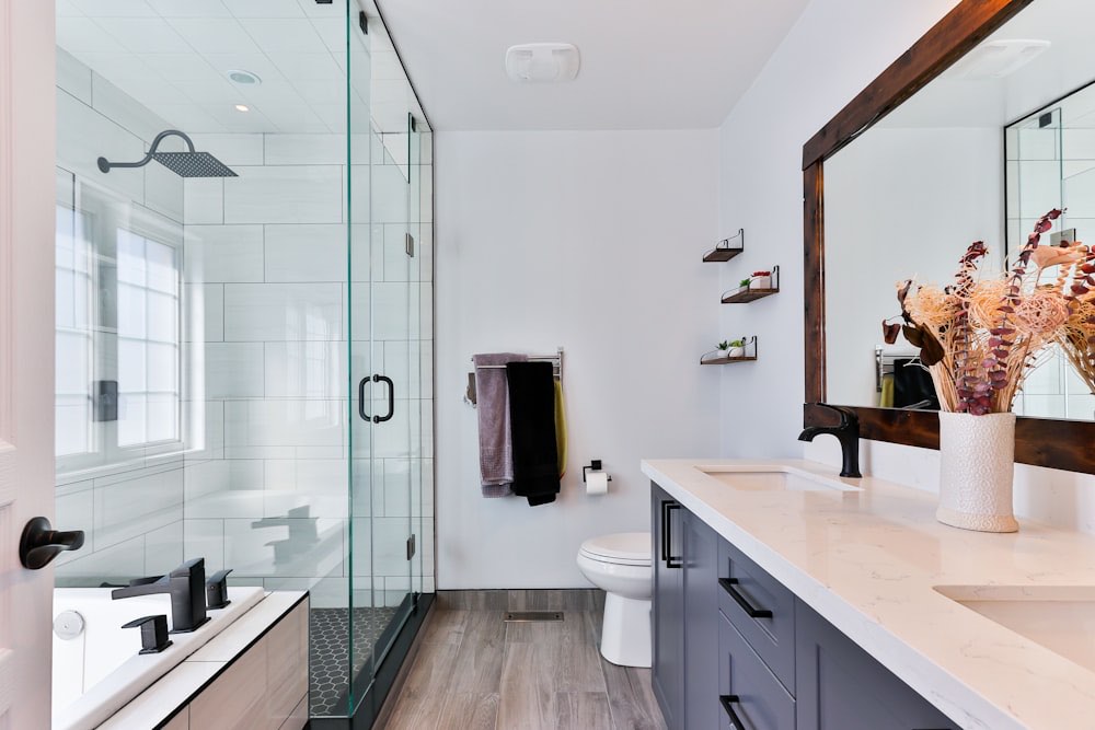 Finished modern bathroom remodel with new fixtures and tile